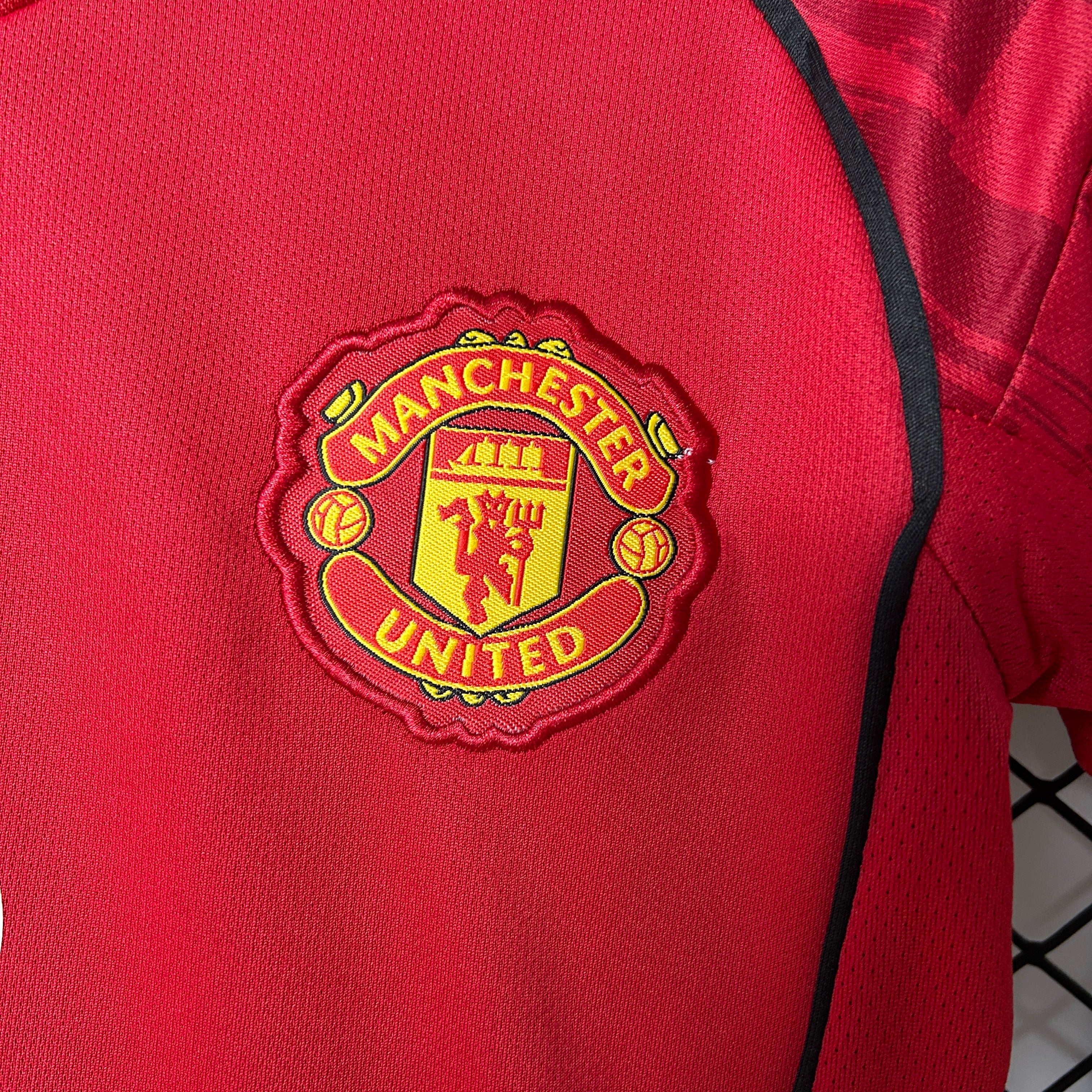Kit Criança Principal Manchester United 2025/2026