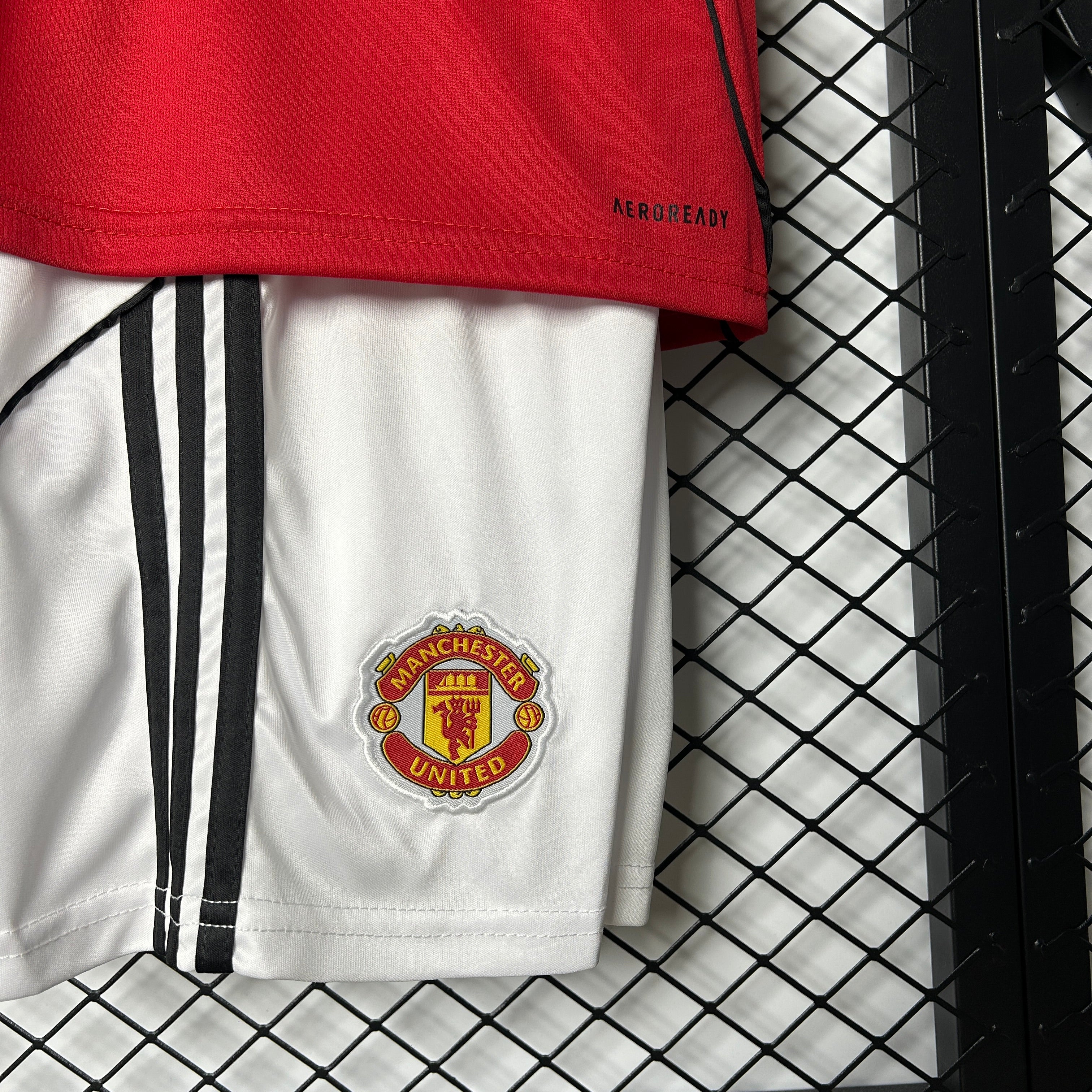 Kit Criança Principal Manchester United 2025/2026